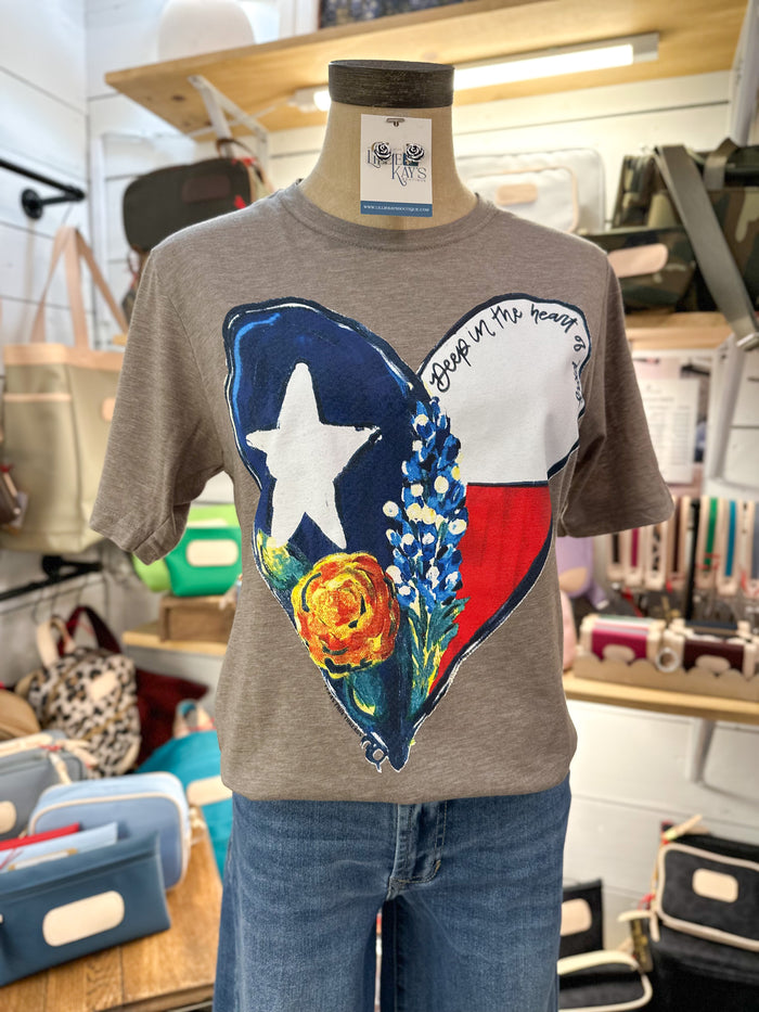 T-shirt with Texas-shaped design on a mannequin in a store setting