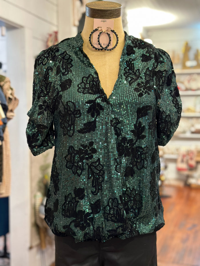 green sequin wrap style top
