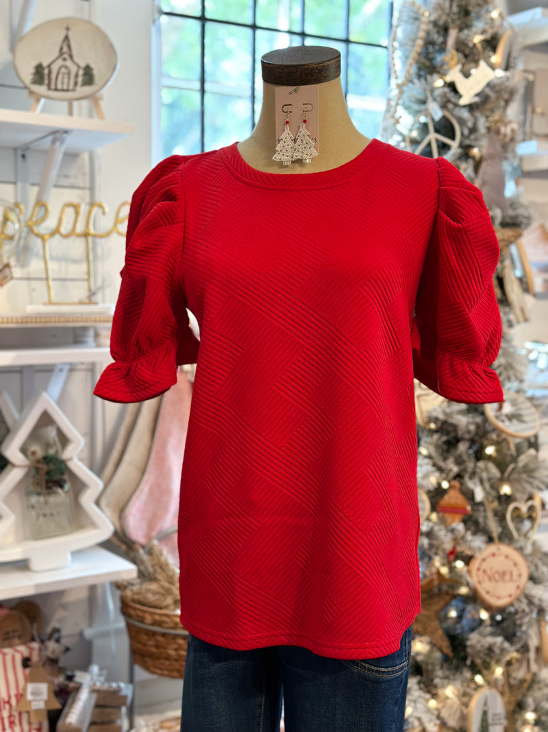 red quilted like top with puffy sleeves washco apparel