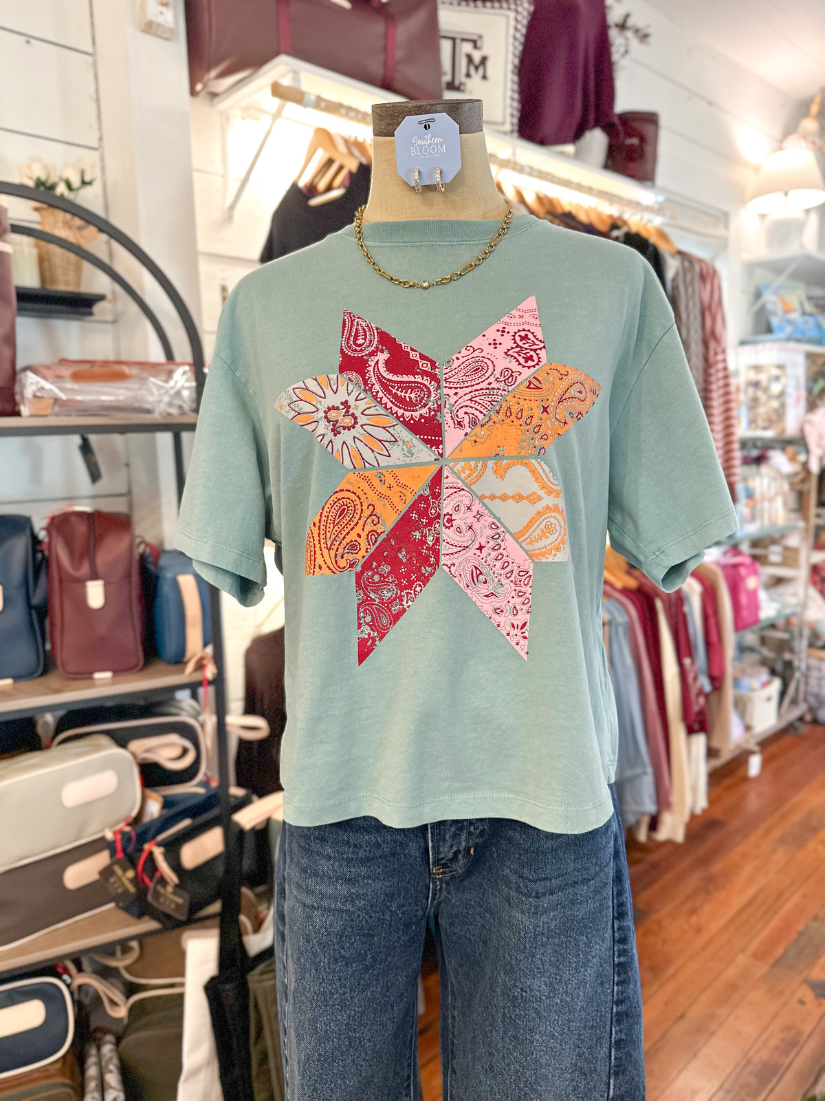 blue crop fit top with bandana print pinwheel design 
poppy pine