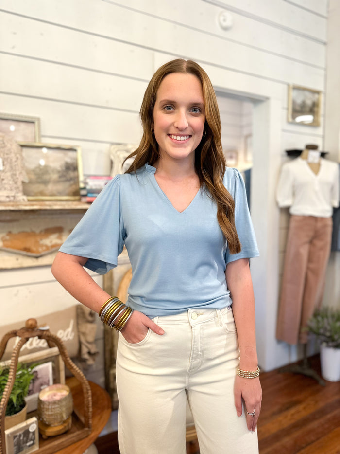 dusty blue basic top with flowy sleeves
