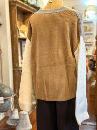 back of sweater with tan and white 