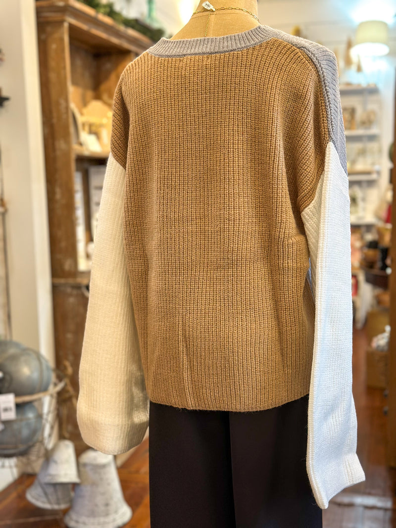 back of sweater with tan and white 