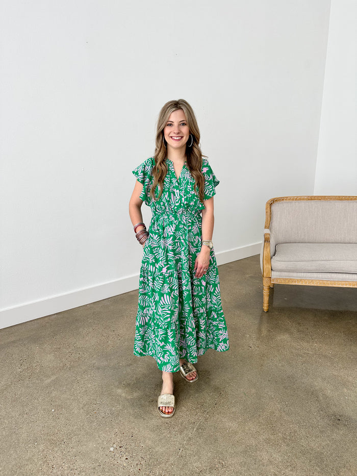 pink and green tropical print dress with elastic and ruffles