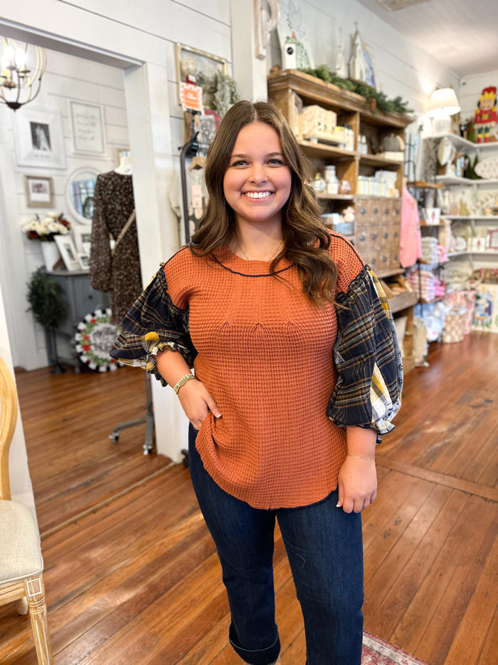 layerz clothing tammy top rust color waffle style top with plaid sleeves 