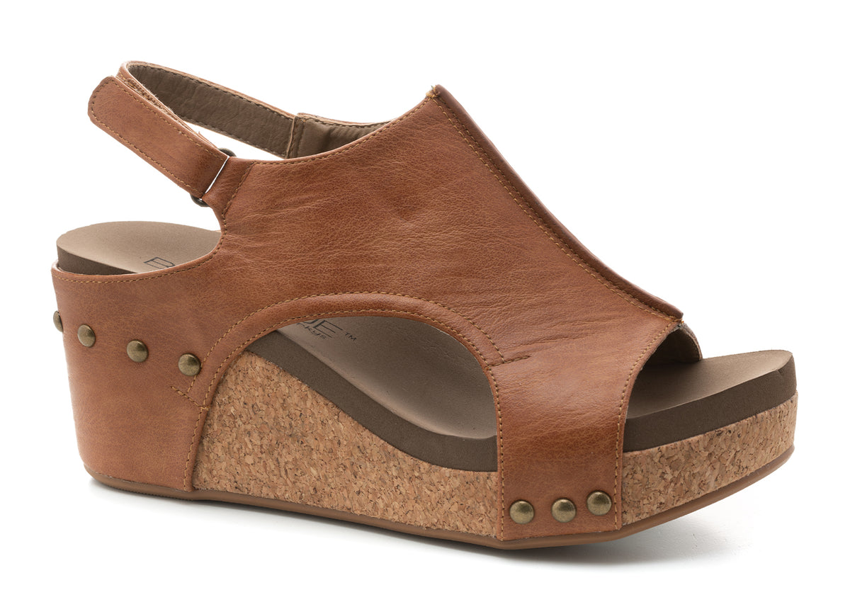 Brown wedge sandal with cork sole on a white background carly cognac smooth 