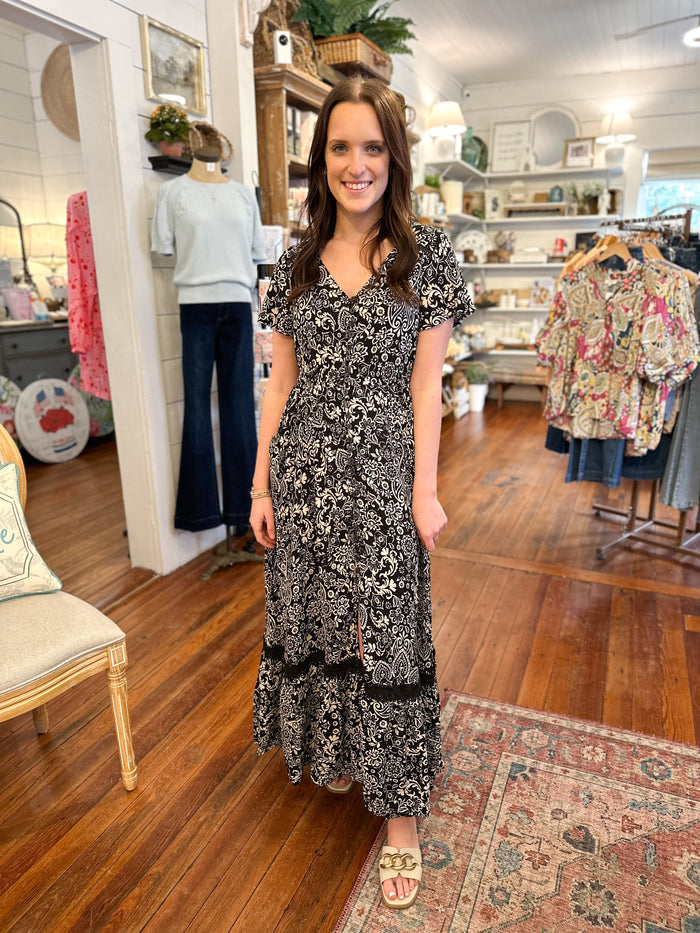 black and cream print maxi dress with accent lace details
