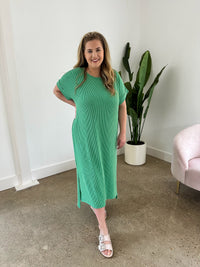 green ribbed entro dress with rolled sleeves