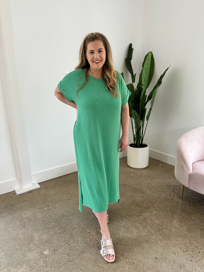 green ribbed entro dress with rolled sleeves