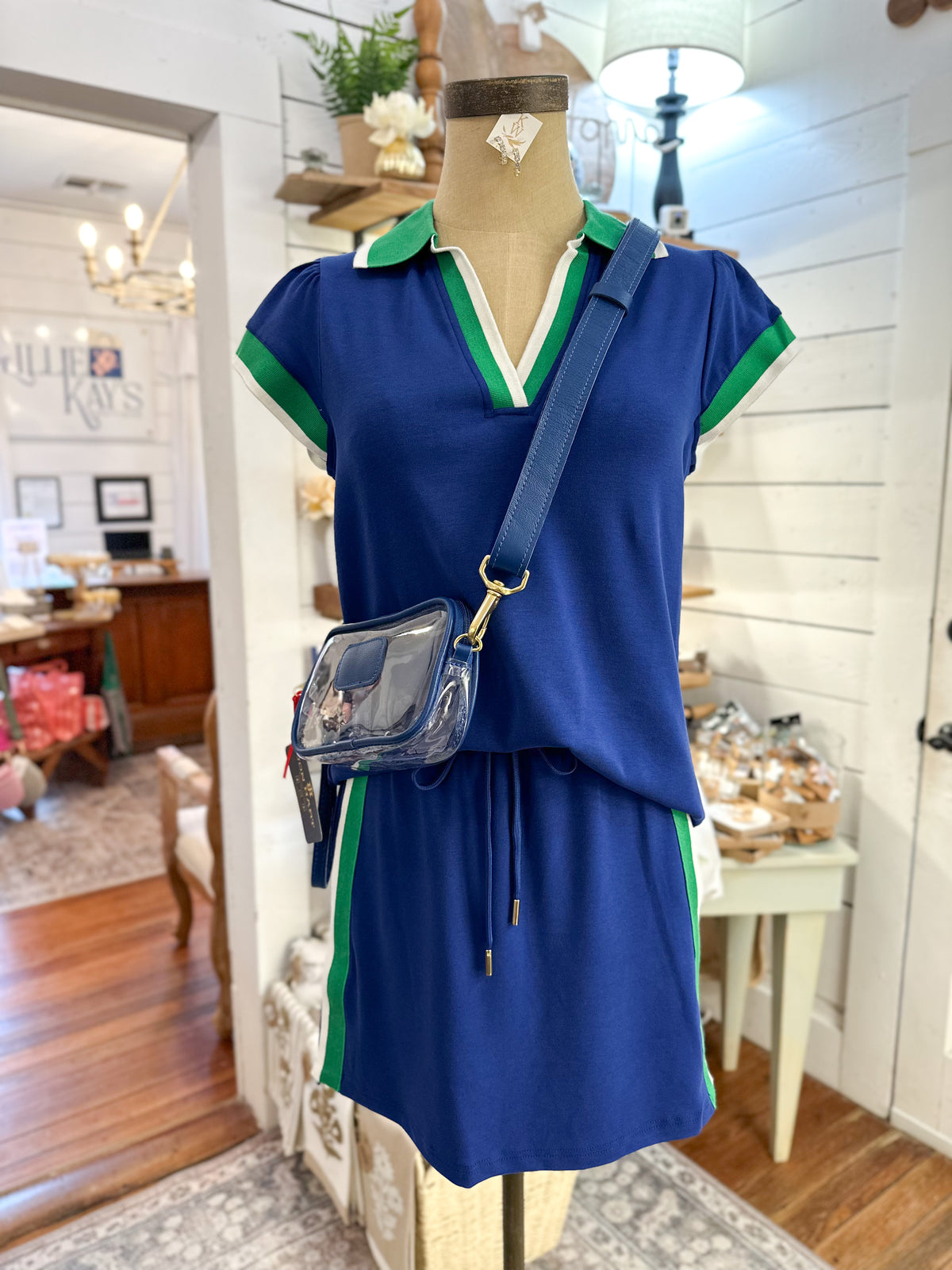 navy blue with green and white trim details skort set 
