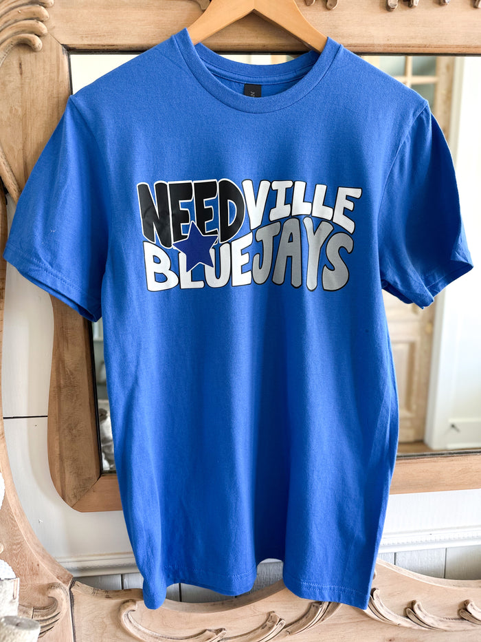 Blue t-shirt with 'NEEDVILLE BLUEJAYS' text on a wooden hanger.