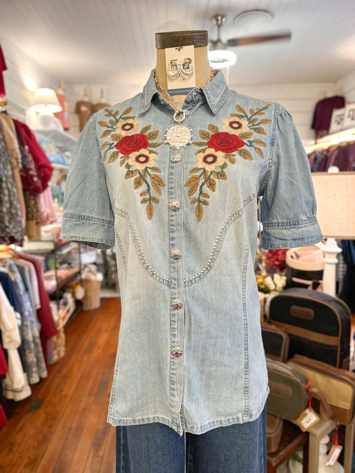 denim puff sleeve embroidered top with silver buttons 
