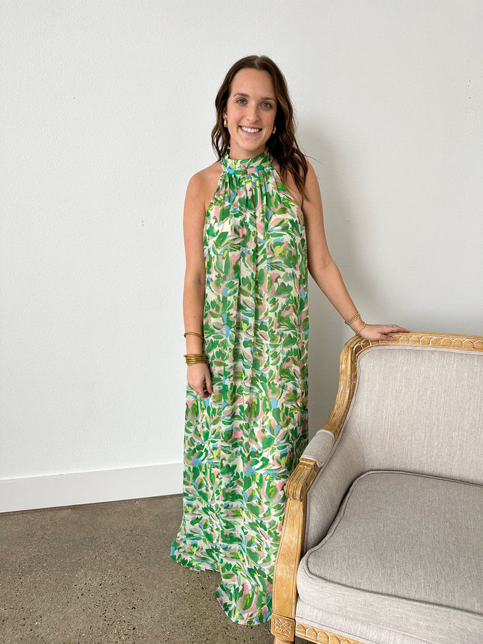 green and pink floral dress with tie around neck