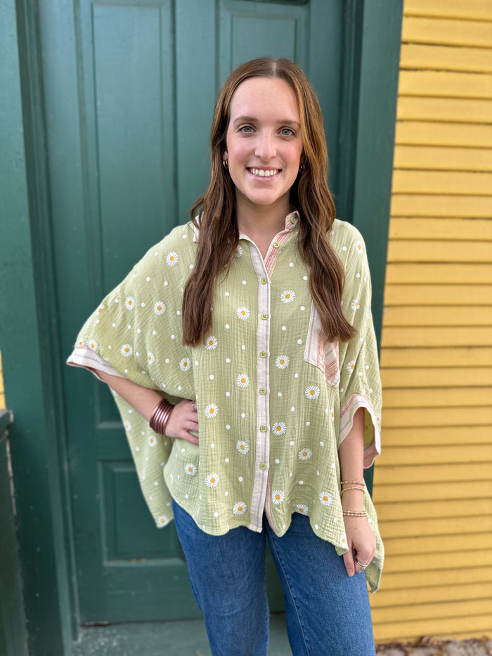 light green button down top with daisies