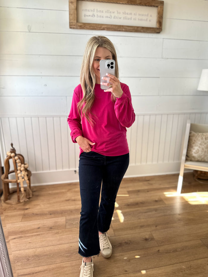 bright pink long sleeve top