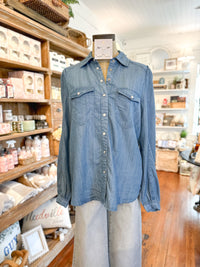 medium wash long sleeve button down pearl snap top
