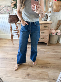 dark wash twist barrel jean high rise 