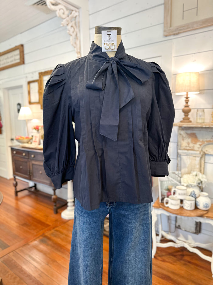 navy puff sleeve top with bow tie 