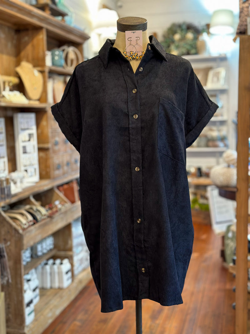 black corduroy style dress with pockets and button down 