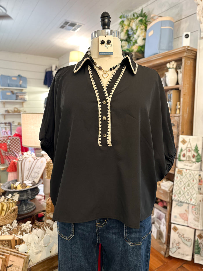 black dolman sleeve top with cream stitching 
