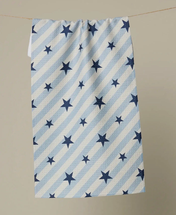 Towel with blue star pattern on a beige background