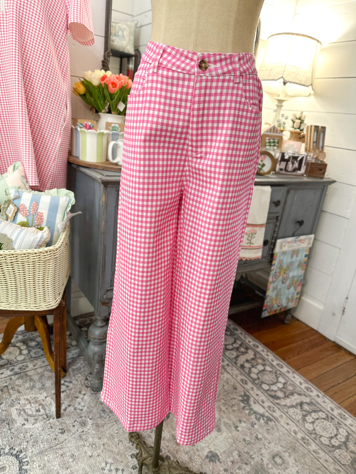 pink and white checkered pants with zipper and button and pockets 
