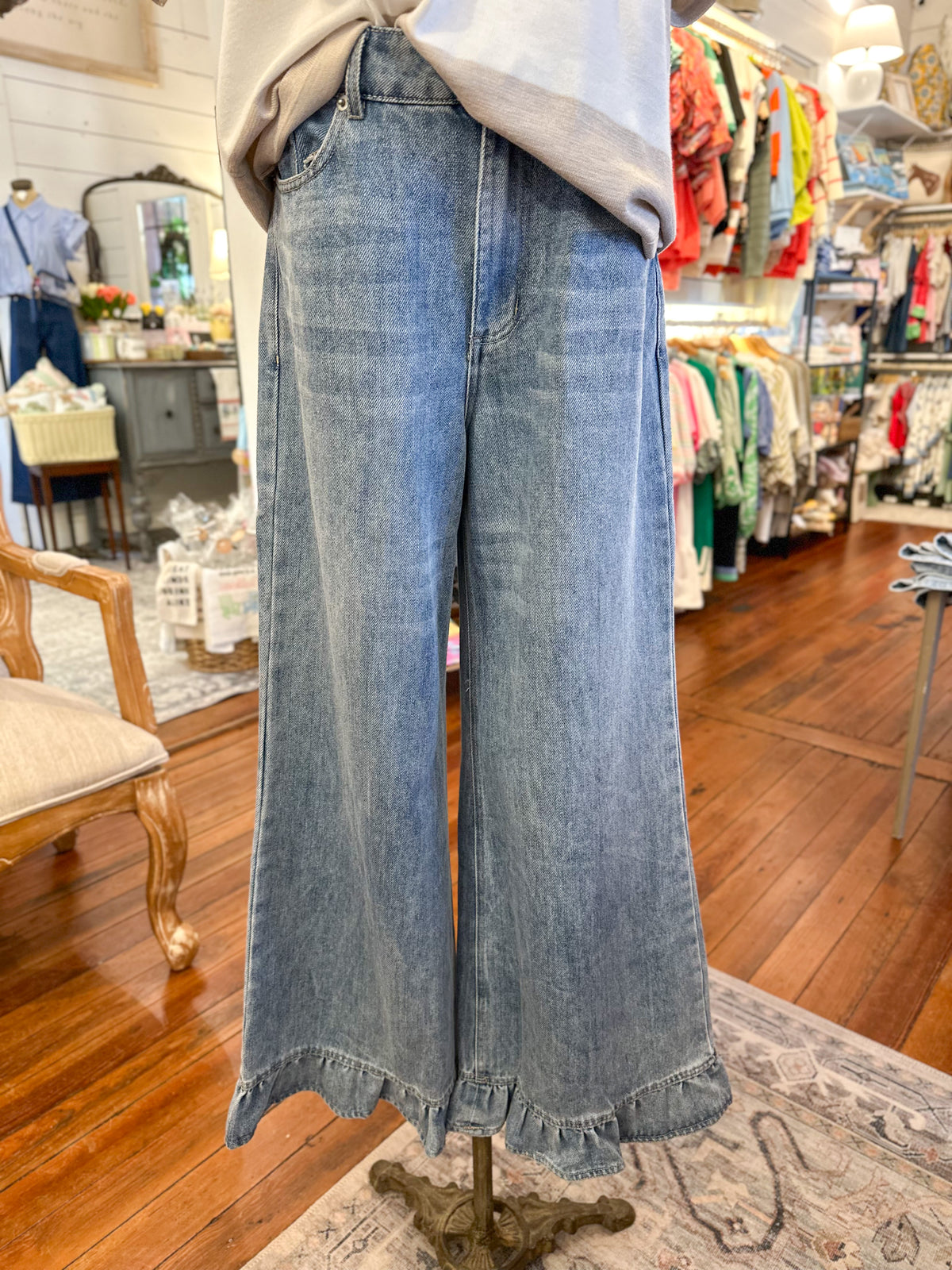 light wash ruffle hem jeans 