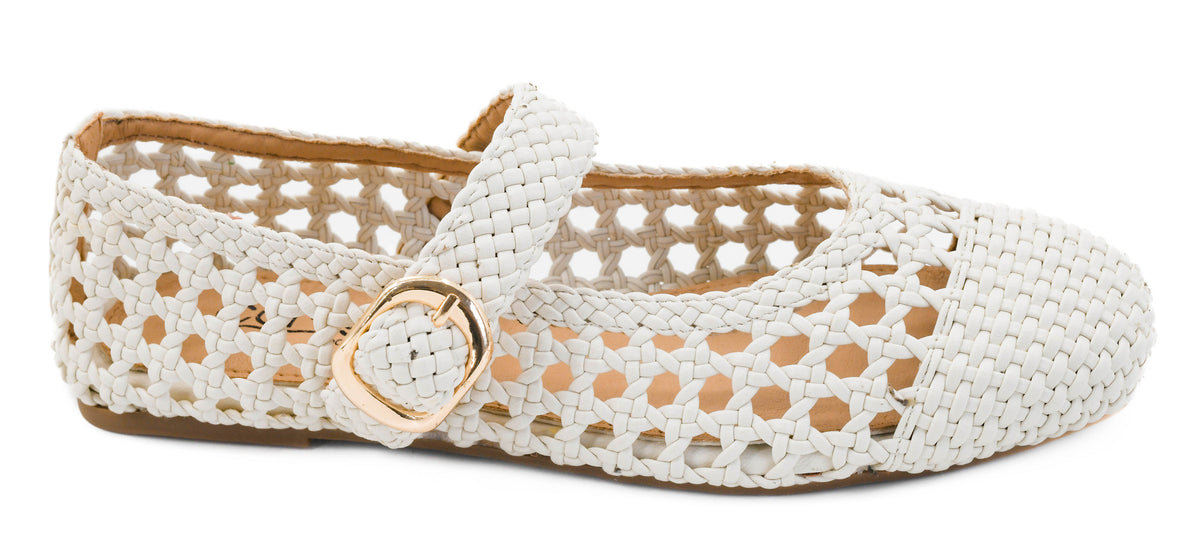 White woven flat shoe with a gold buckle on a white background corkys mixed feelings 