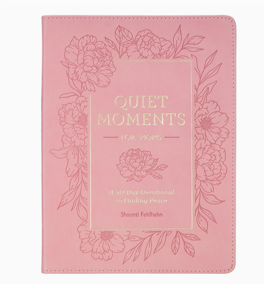 Pink book cover with floral designs and text on a white background