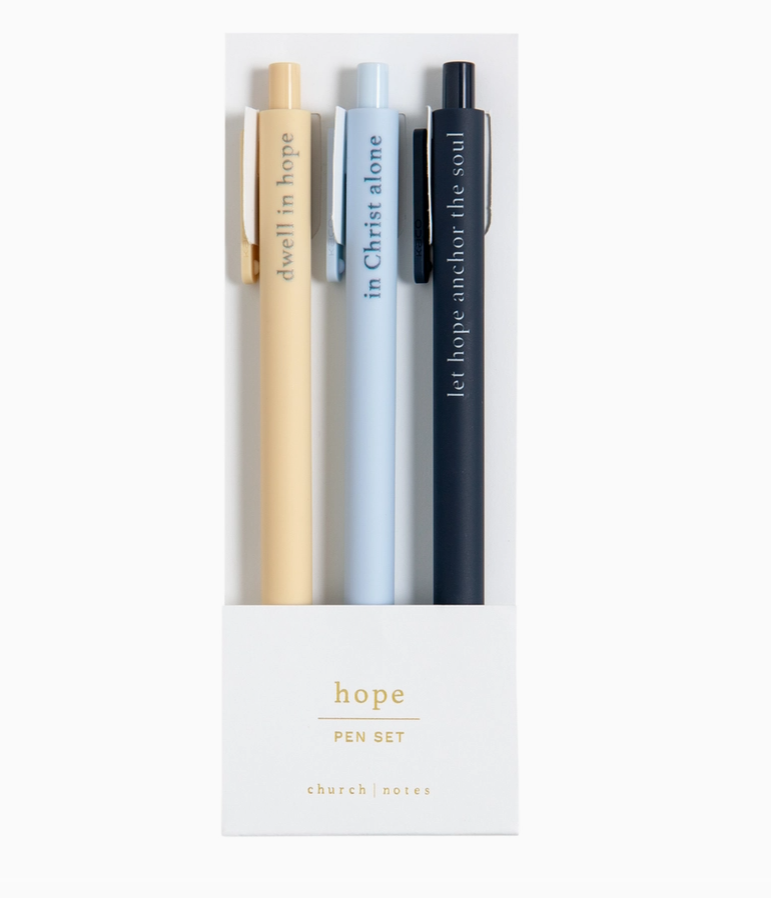 Three pens in gold, silver, and black with motivational phrases in a white box labeled 'hope pen set'.