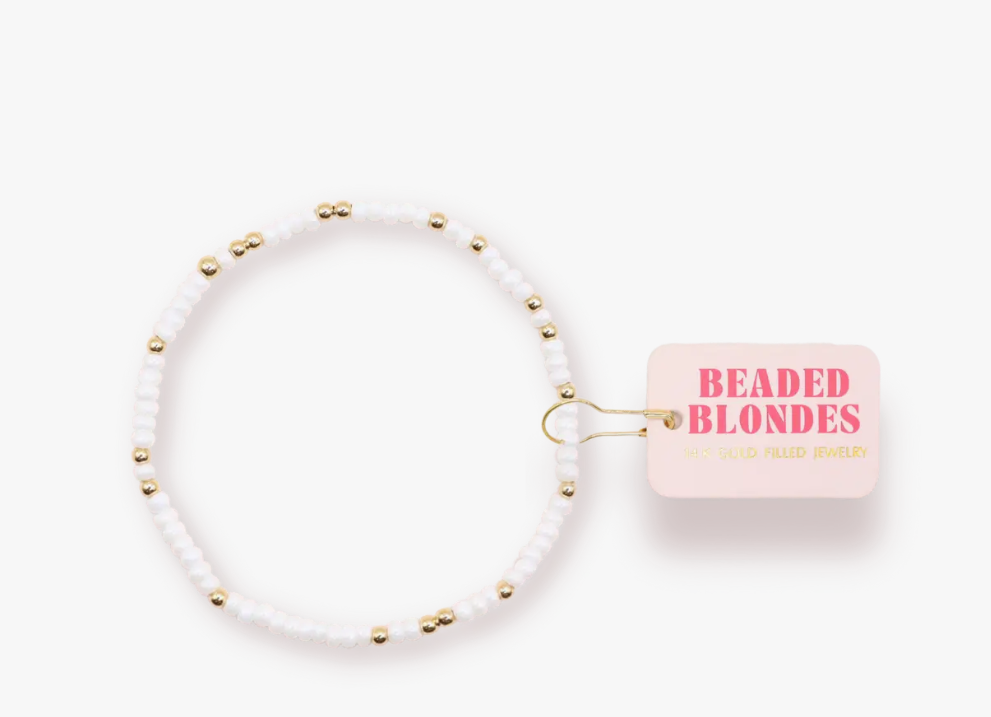 white beaded bracelet for kids with gold accent beads
