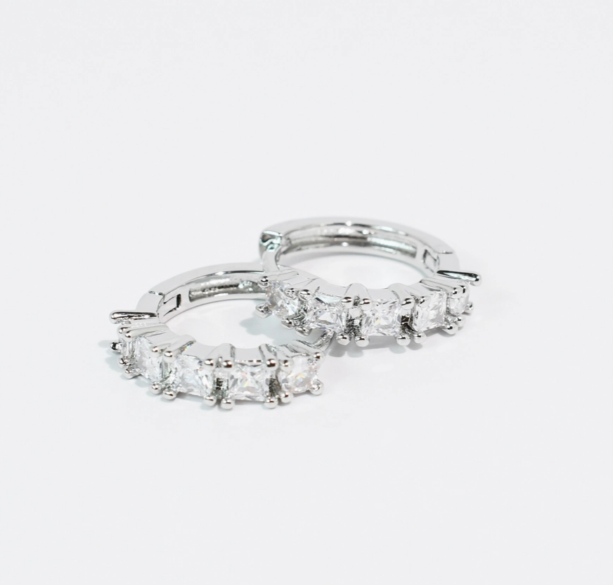 silver huggie style earring 