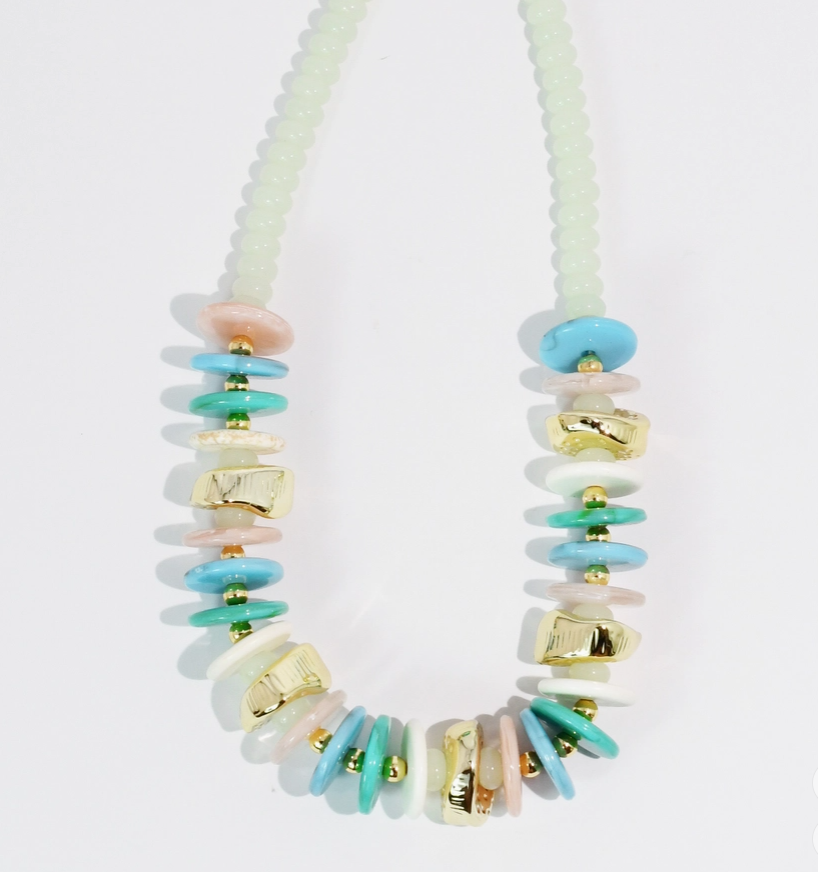 Necklace with multicolored beads on a white background