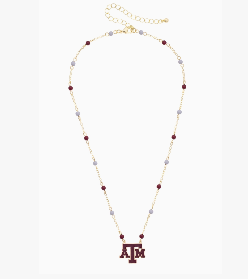 A gold chain necklace featuring maroon and light gray beads, with a maroon Texas A&M 'A&M' logo pendant at the center, displayed on a clean white background.
