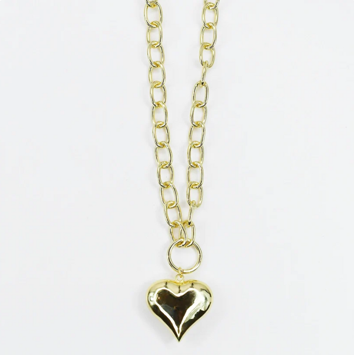 A gold chain necklace with a polished, reflective gold heart-shaped pendant, displayed against a clean white background.