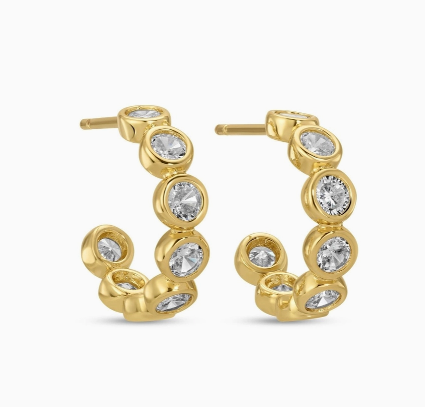 small row of sparkling hoop earrings 