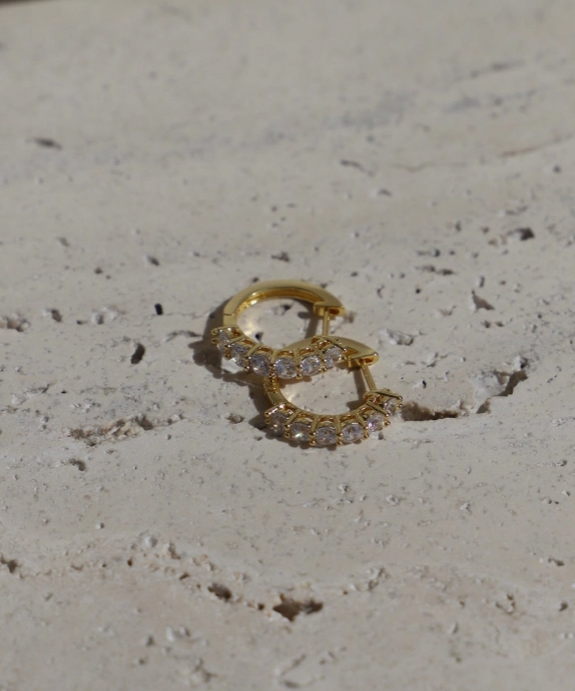 gold earring with cubic zirconium  stones latch closure huggie earring 