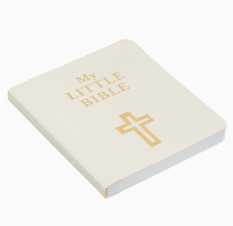 Small beige book titled 'My Little Bible' with a gold cross on a white background