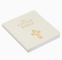 Small beige book titled 'My Little Bible' with a gold cross on a white background