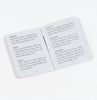 Open book with text on a white background