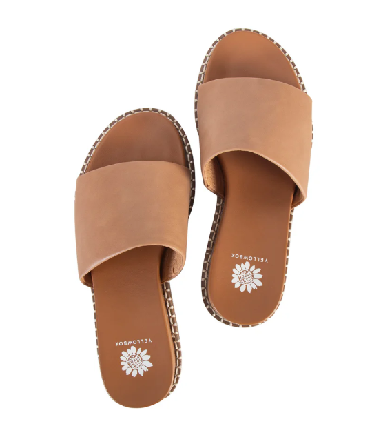 Pair of tan sandals with a visible brand logo on a white background yellowbox lewis 