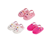 Three pairs of fuzzy toddler slide sandals on a plain white background: one light pink, one white, and one bright hot pink, each decorated with small multicolored rhinestone-like embellishments.