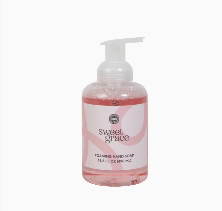 A bottle of Sweet Grace brand foaming hand soap with pink liquid and a white pump dispenser, set against a plain white background.