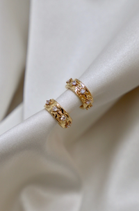 gold plate over brass star hoop earring 