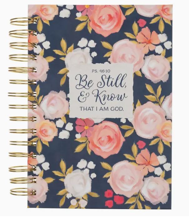 Floral notebook with 'Be Still & Know That I Am God' text on a navy background
