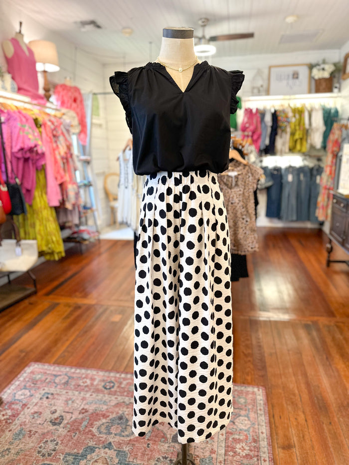 black and cream polka dot pants 