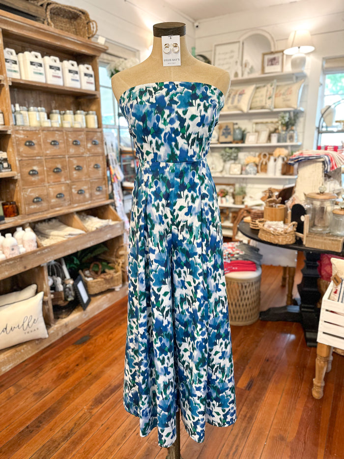 blue green and white floral jumpsuit with tie back 