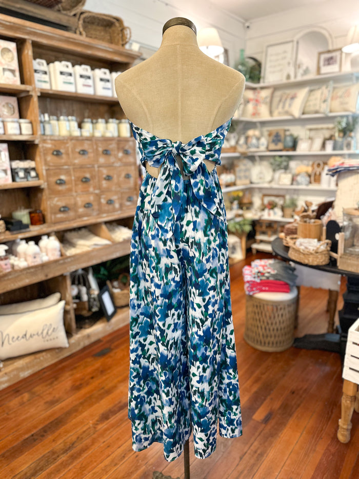 blue green and white floral jumpsuit with tie back 