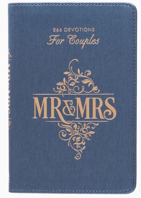 Blue book titled '365 Devotions For Couples MR & MRS' with decorative text on a white background