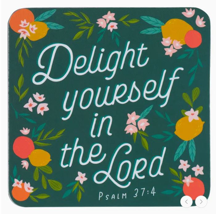 Decorative magnet with 'Delight yourself in the Lord' text and floral design on a green background